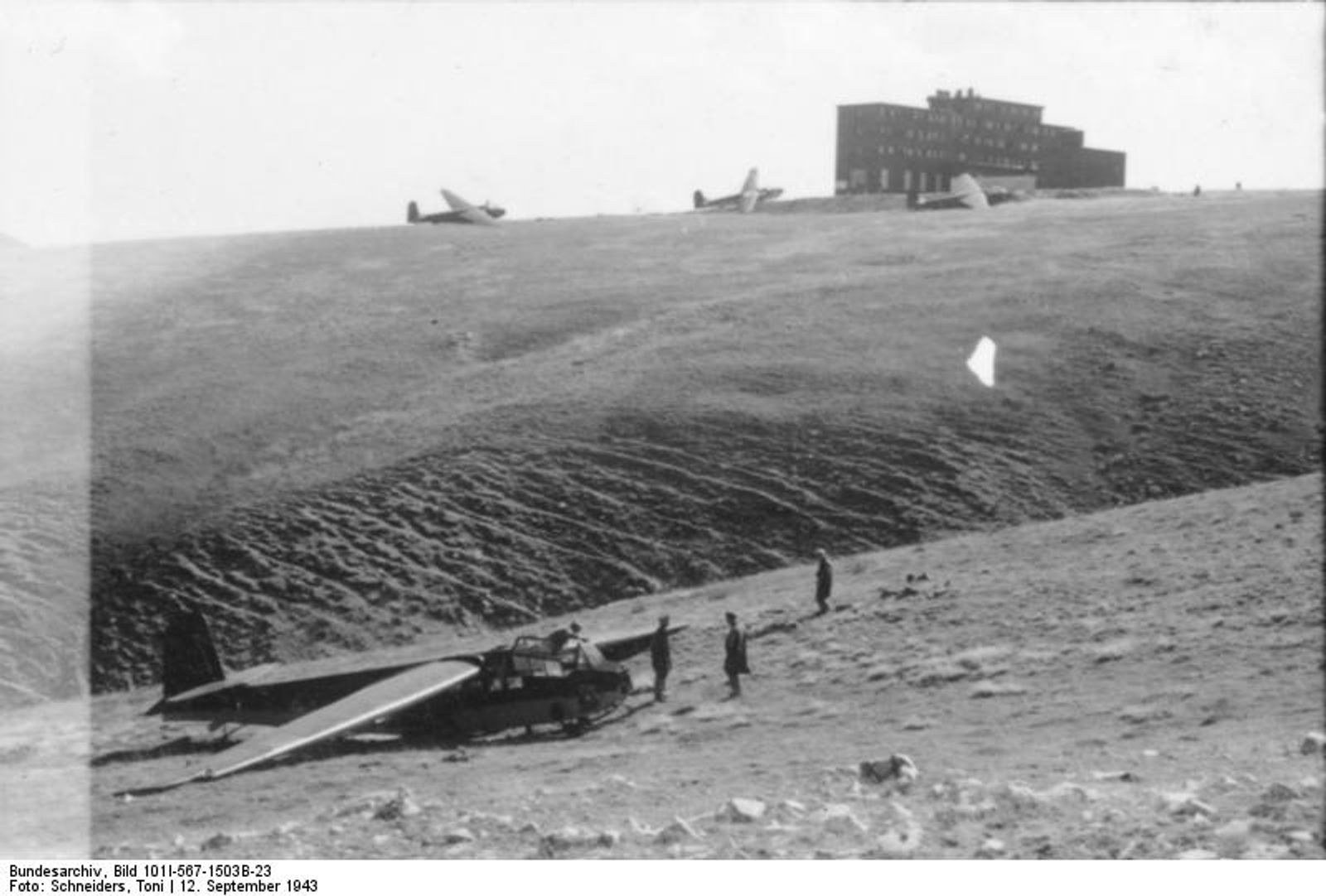 German DFS 230 gliders resting on the rocky Campo Imperatore plateau with Hotel Campo Imperatore in the background on September 12, 1943.
