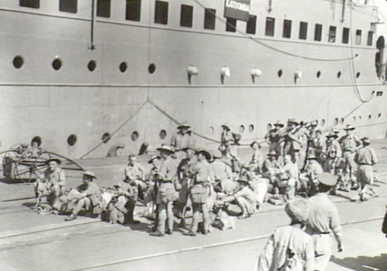 Australian troops waiting to board the passenger ship Katoomba at Bombay in March 1942.