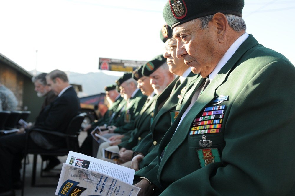 Isaac “Ike” Camacho, wearing a Special Forces beret and green blazer, seated with other Special Forces Association members at a Fort Bliss ceremony in 2011.