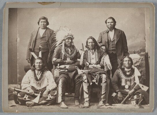 1877 studio group portrait of Ponca leaders and interpreters, including Standing Bear, during a delegation to Washington, D.C.