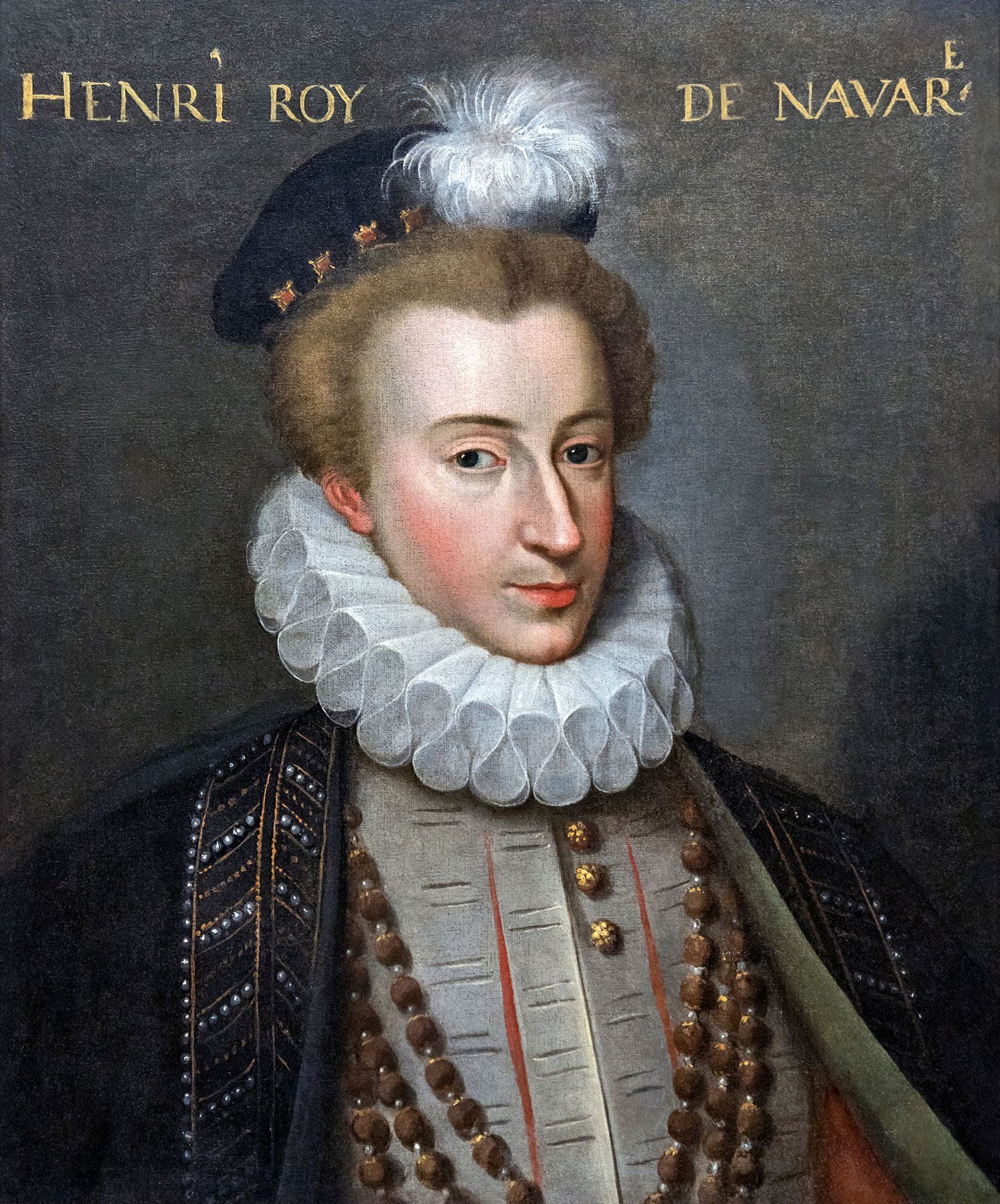 Sixteenth-century portrait of the young Henry of Navarre in elaborate court dress with a feathered cap and ruff.