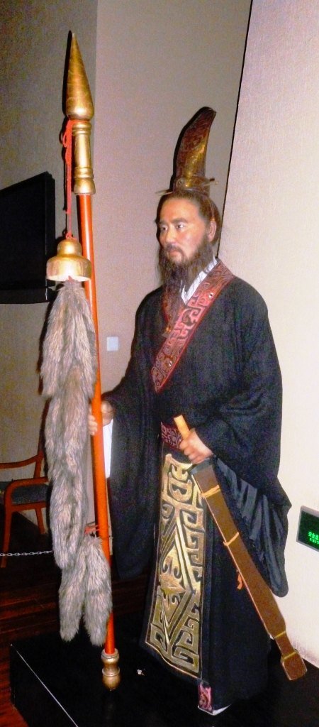 Modern museum statue representing Han envoy Zhang Qian, holding an envoy's staff.