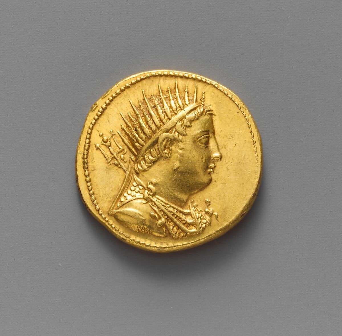 Gold Ptolemaic oktadrachm minted at Alexandria under Ptolemy IV, showing the deified head of Ptolemy III.