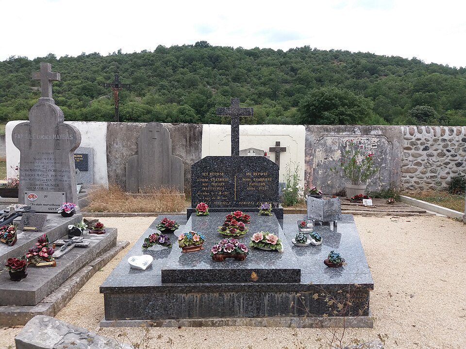 Henri Charrière's grave in the cemetery at Lanas, Ardèche, photographed in 2018.