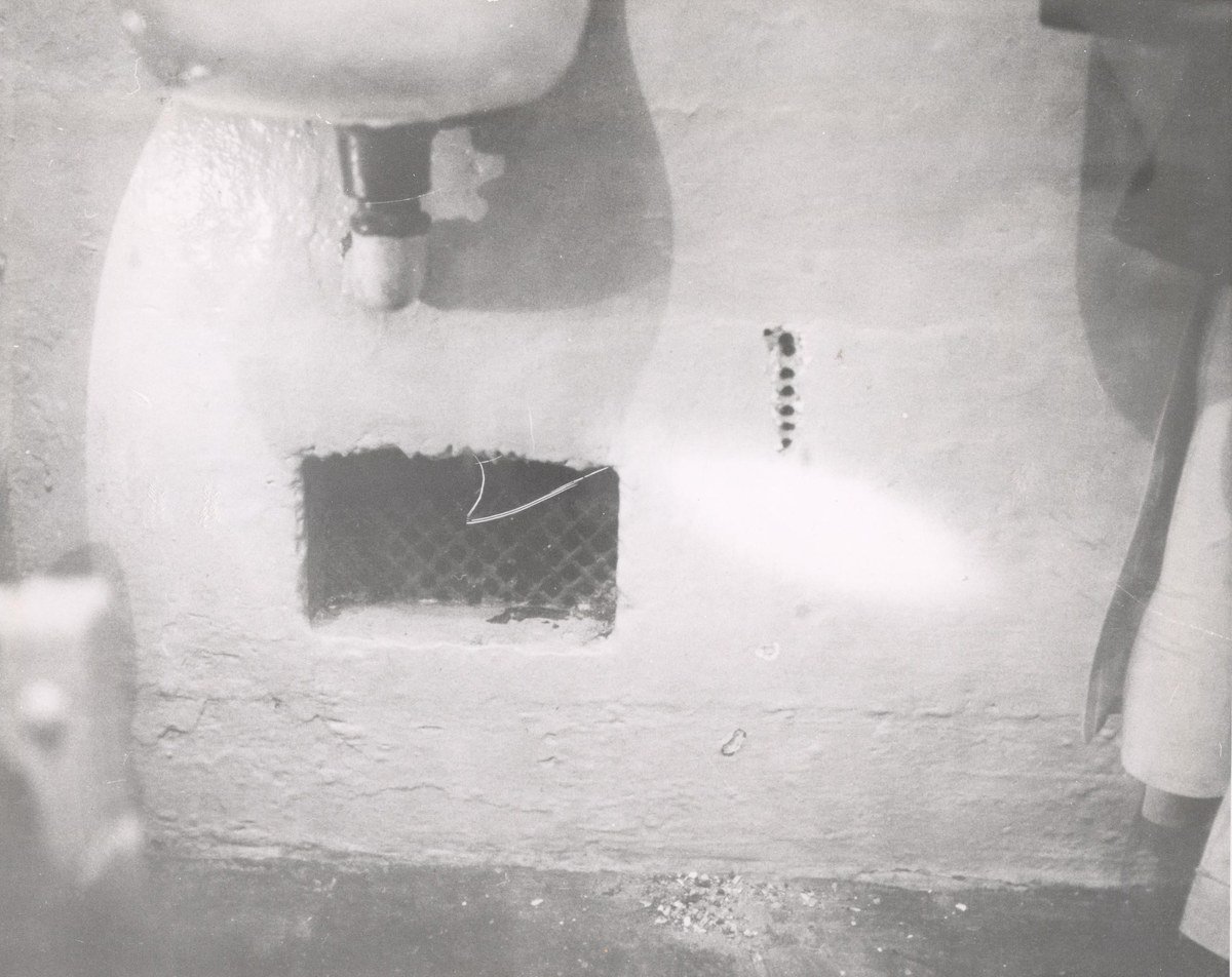 Enlarged ventilation opening behind Frank Morris's Alcatraz cell leading to the utility corridor used in the 1962 escape.
