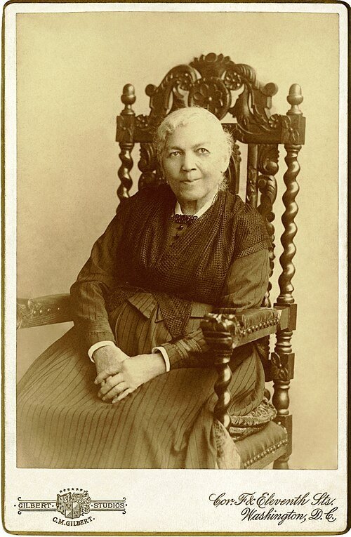 Harriet Jacobs seated for a formal studio portrait in Washington, D.C., in 1894.